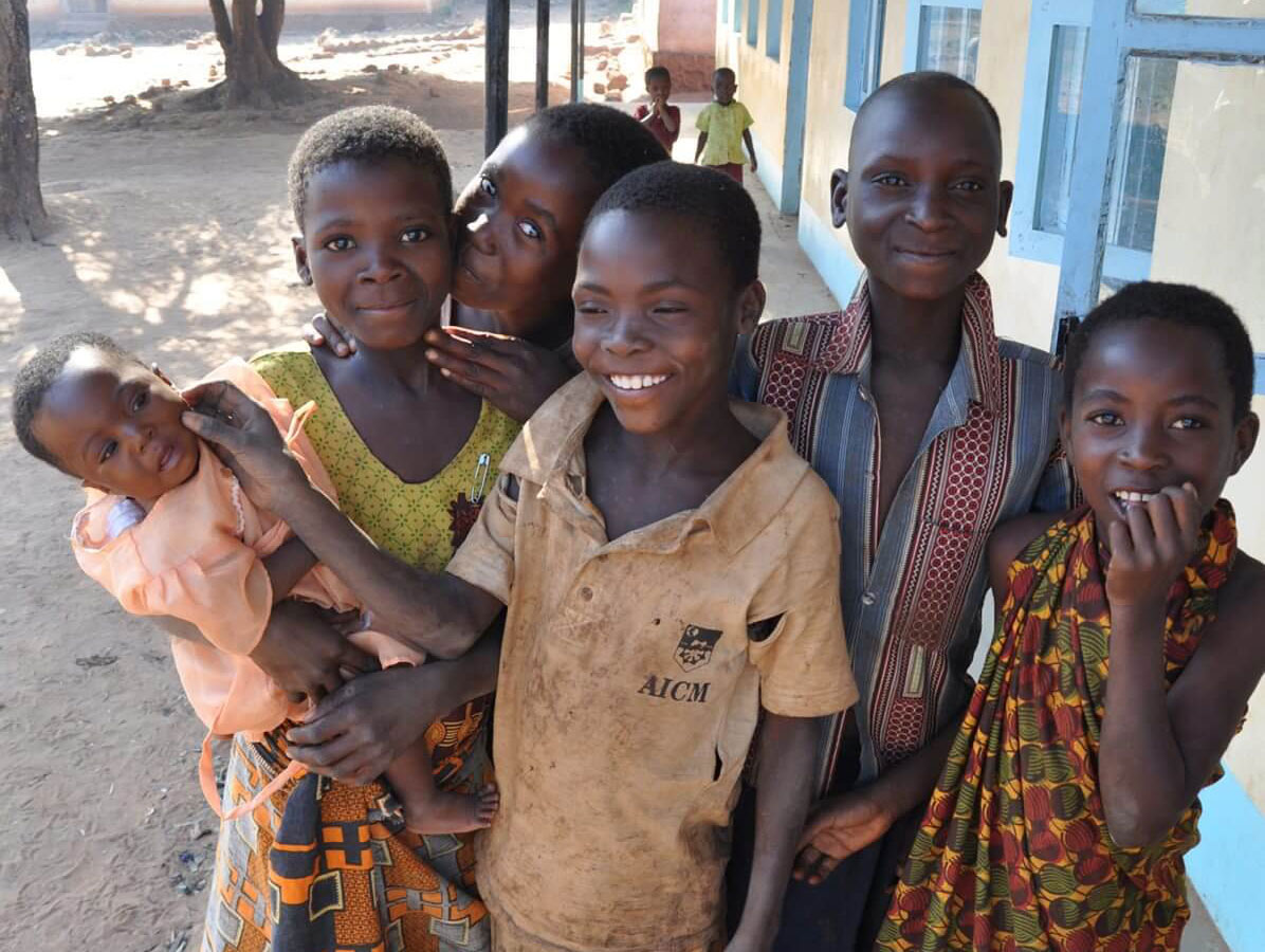 Tanzania Ngwala Local children gathering outside Ngwala village school